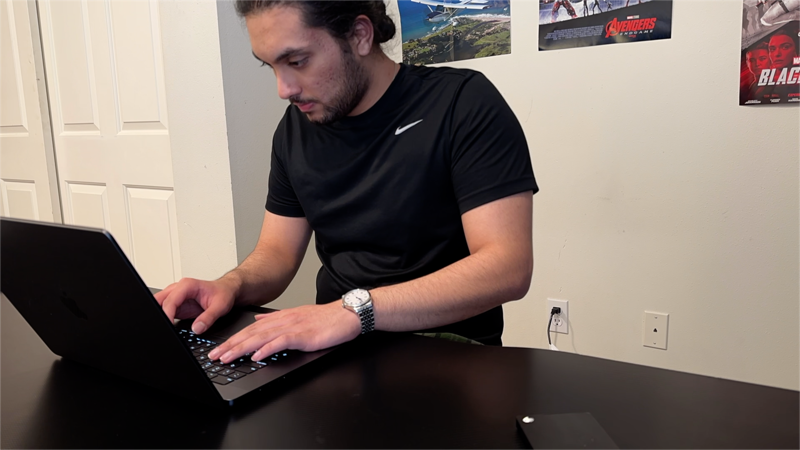 Gunek Singh working on AI projects